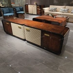 Refined TV Stand with Quilted Upholstered Panels, Natural Wood Veneer Finish and Brushed Stainless Steel Handles